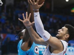 Jamal Murray (izq.) destacó ayer por los Nuggets ante el Thunder, convirtiéndose en el mejor anotador del equipo de Denver con 27 puntos. AP / S. Ogrocki