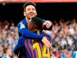 El argentino hizo el primero de sus tantos con un efectivo cobro de tiro libre desde el borde del área a los 71'; en el 89' cerró la cuenta con un remate dentro del área. AFP / L. Gene