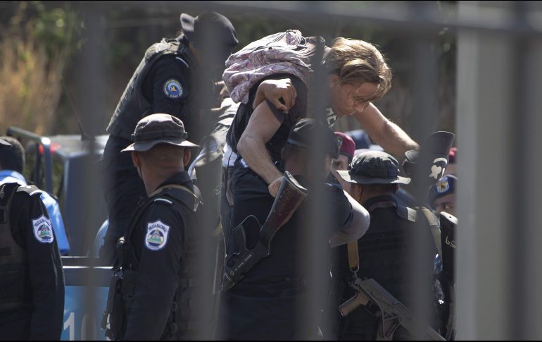 Policías antidisturbios interrumpen una manifestación fugas o 