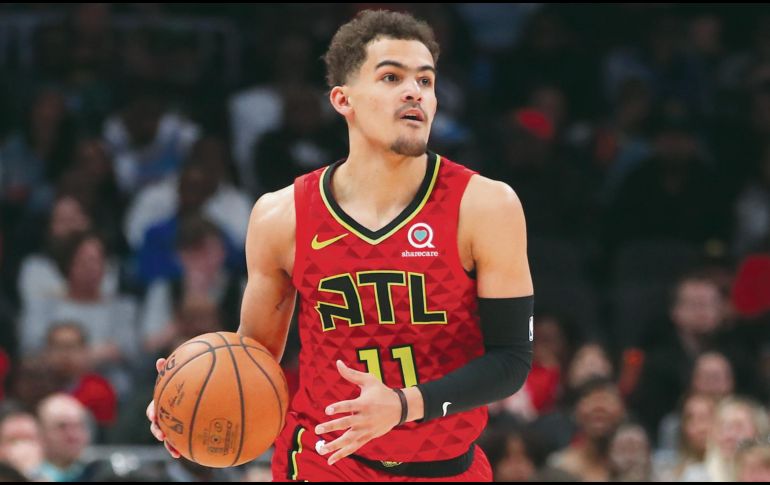 Trae Young fue la figura al conseguir la canasta de la victoria para los Hawks. AP