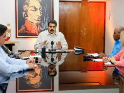 Nicolás Maduro habla desde el Palacio de Miraflores durante un anuncio transmitido de forma obligatoria por radio y televisión. AFP/Presidencia de Venezuela