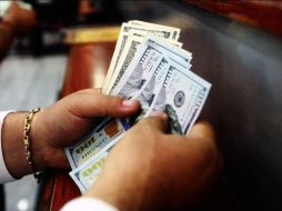 El Banco BASE prevé que el tipo de cambio cotice entre 19.15 y 19.35 pesos por dólar. EL INFORMADOR / ARCHIVO