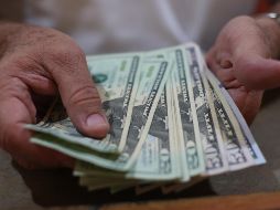 El Banco BASE prevé que el tipo de cambio cotice entre 18.70 y 18.90 pesos por dólar en ventanillas bancarias. EL INFORMADOR / ARCHIVO