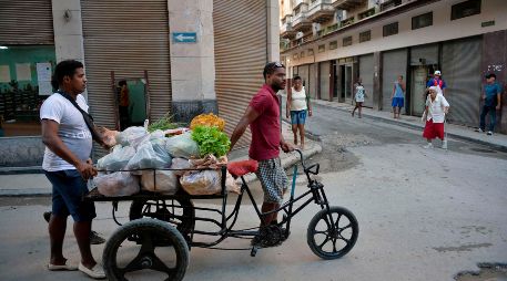 Factores como el posible efecto de la desaceleración en Estados Unidos y China, y un hipotético aumento de las tasas de interés de la Fed influyeron en la reducción del pronóstico. AFP/ARCHIVO