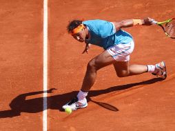 Una hora con 16 minutos necesitó Nadal para quedarse con el triunfo en la que es su superficie favorita, la tierra batida. AFP / V. Hache