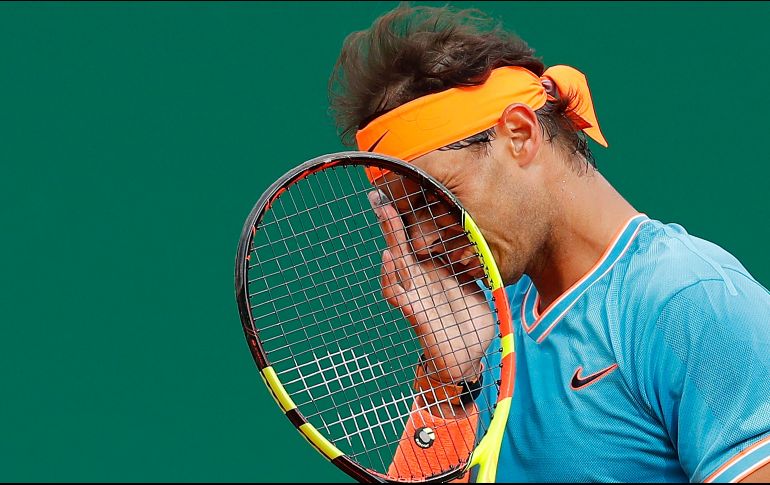 Nadal no se sintió a gusto en ningún momento del partido en un torneo que ha ganado en once ocasiones, las tres últimas de forma consecutiva. EFE / S. Nogier