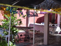 Los sujetos amenazaron a todos los asistentes y comenzaron a disparar contra algunos de ellos; a los sobrevivientes, quienes se habían tirado al piso y mantenían la vista abajo, los obligaron a mirar como remataban a sus conocidos. AFP/ A. Hernández