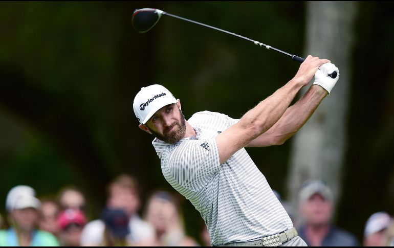Dustin Johnson tuvo una tercera ronda de 68 golpes, tres abajo de par y llegó a un total de -10 para el campeonato. AFP/J. Tilton