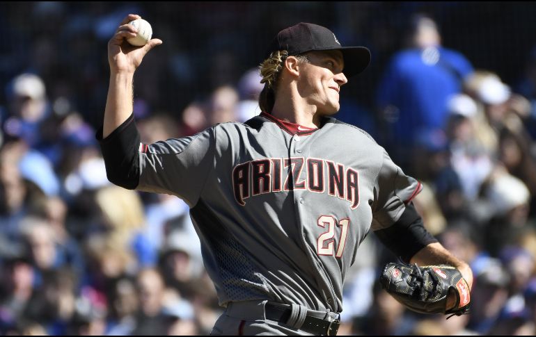 Greinke (3-1) lanzó seis episodios, permitió tres imparables, dio dos pasaportes y retiró a cuatro por la vía del ponche. AFP/D. Banks