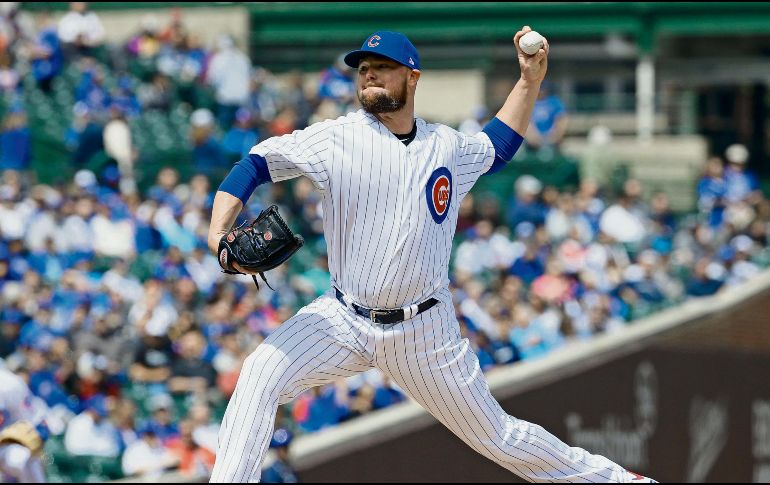 Jon Lester volvió a la lomita tras una lesión en el muslo izquierdo. AFP