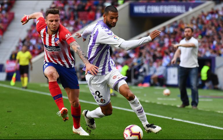 Los colchoneros mantuvieron la ventaja en gran parte gracias al trabajo del portero Jan Oblak y de una polémica decisión del árbitro, quien no concedió un penal al rival. AFP / G. Bouys