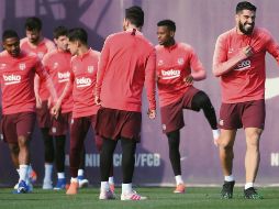 Las sonrisas abundan con el campeón de España en la víspera del duelo de Champions League. AFP