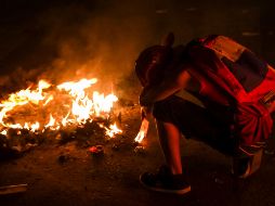 Se elevaron a cuatro las muertes que dejaron las protestas antigubernamentales de los últimos dos días en Venezuela tras el fallido alzamiento militar. EFE/ M. Gutiérrez