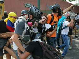 Ambas naciones buscan que haya una solución pacífica en Venezuela. AP / R. Abd