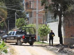 Policías municipales resguardan la zona en donde ocurrieron los hechos. ESPECIAL/Policía de Tlajomulco