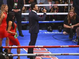 Rivera respondió a las críticas de algunos tras interpretar el himno en la pelea en la que el “Canelo” salió victorioso. MEXSPORT / ARCHIVO