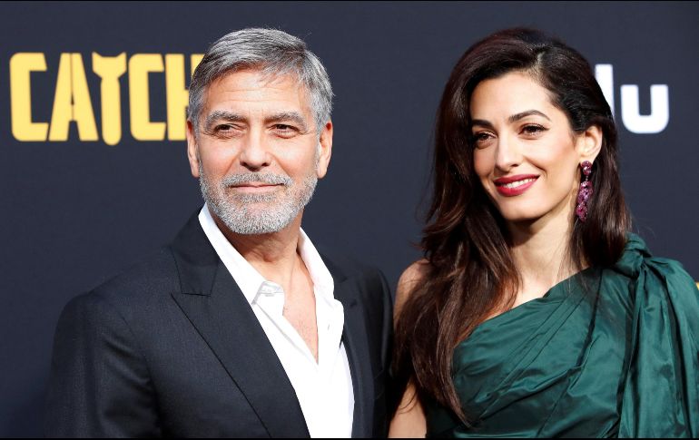 El actor George Clooney y su esposa Amal, aseguran que asistieron al baby shower de la duquesa de Sussex y han vacacionado con la pareja real. EFE / N. Prommer