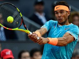 Rafael Nadal regresa una bola a Frances Tiafoe. EFE