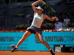 En la primera manga, la rumana apenas tuvo problemas para imponerse con tres roturas que le dieron el set. AP / B. Armangue