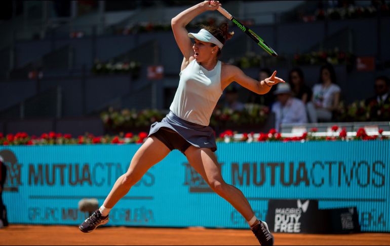 En la primera manga, la rumana apenas tuvo problemas para imponerse con tres roturas que le dieron el set. AP / B. Armangue