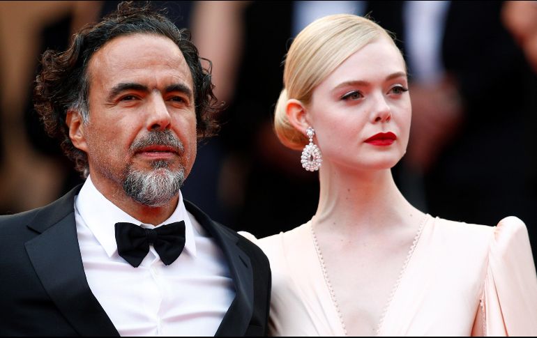 Alejandro González Inarritu y la actriz estadounidense Elle Fanning. EFE / I. Langsdon