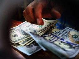 El tipo de cambio para solventar operaciones denominadas en moneda extranjera pagaderas en el país se ubica en 19.1427 pesos. EL INFORMADOR / ARCHIVO