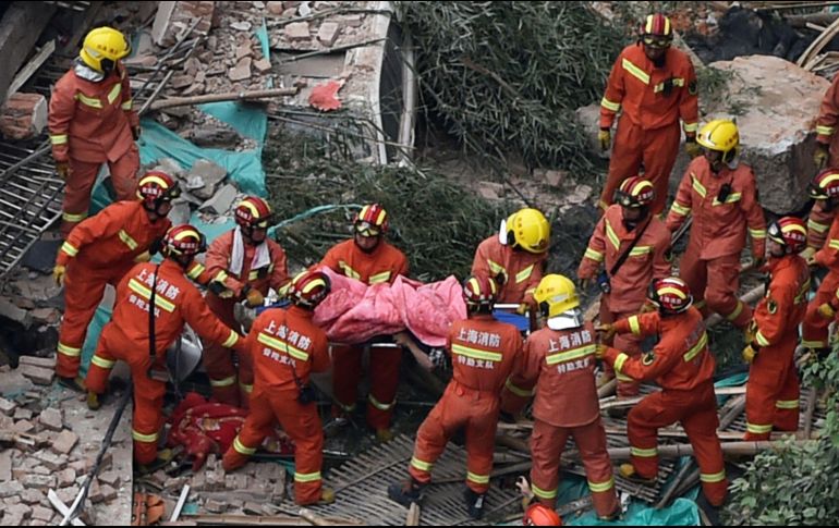 El inmueble era convertido a una sala de exhibición de autos cuando se vino abajo alrededor de las 11:30 de la mañana. AFP/H. Retamal