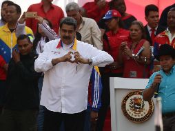 Nicolás Maduro (c) participa en un acto de gobierno en Caracas para celebrar el primer aniversario de las elecciones en las que se proclamó ganador. EFE/R. Peña