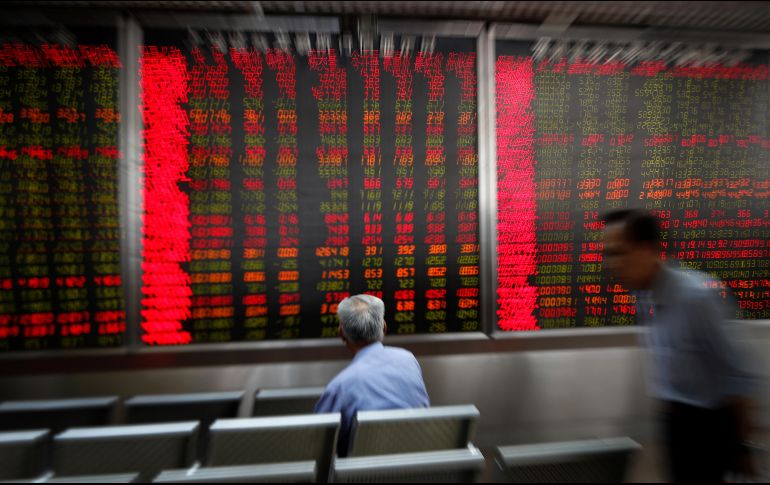 Las acciones relacionadas con la energía retrocedieron debido a un descenso en el precio del petróleo. AP/A. Wong