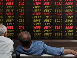 El mercado mexicano terminó en línea con los índices accionarios de Estados Unidos. AP/A. Wong