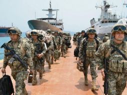 Los oficiales llegaron apoyados con vehículos. NOTIMEX