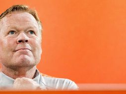 El técnico holandés fue preguntado en rueda de prensa si podía desmentir su candidatura como eventual técnico blaugrana, a lo que respondió: ''Eso sería lo fácil, pero no lo voy a hacer''. EFE / K. Van Weel