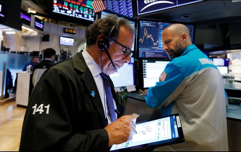 Los principales indicadores finalizaron en terreno negativo al continuar la preocupación por las tensiones entre Estados Unidos y China. AP/R. Drew