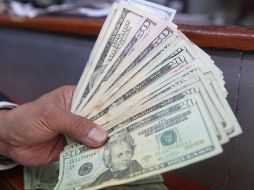 En la sesión de este martes se prevé que el tipo de cambio cotice entre 19.55 y 19.80 pesos por dólar. EL INFORMADOR / ARCHIVO