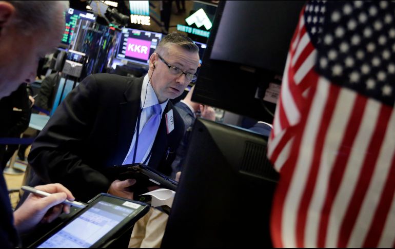 El índice industrial Dow Jones reporta un alza de 31.07 puntos (0.12 por ciento) para colocarse en 25 mil 570.64 unidades. AP / ARCHIVO