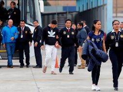 Ciudadanos venezolanos en el aeropuerto de Callao, antes de ser deportados. AFP/Ministerio del Interior del Perú.