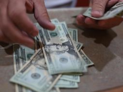 Este viernes, la moneda se adquirió en un mínimo de 18.50 pesos. EL INFORMADOR/ARCHIVO