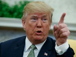 Trump acusó a Beijing de hacer caer su moneda para anular el efecto de los nuevos aranceles. AP / ARCHIVO