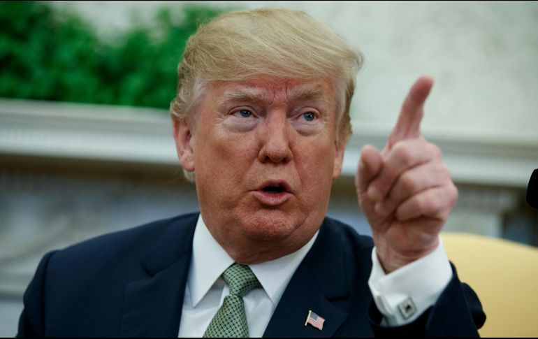 Trump acusó a Beijing de hacer caer su moneda para anular el efecto de los nuevos aranceles. AP / ARCHIVO