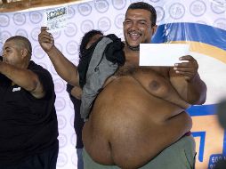 En la actividad, además de elegir al padre que tenía la barriga más grande, también se eligió padre más anciano, al más bailarín, al que contó mejores chistes y al mejor cantante. EFE/J. Torres