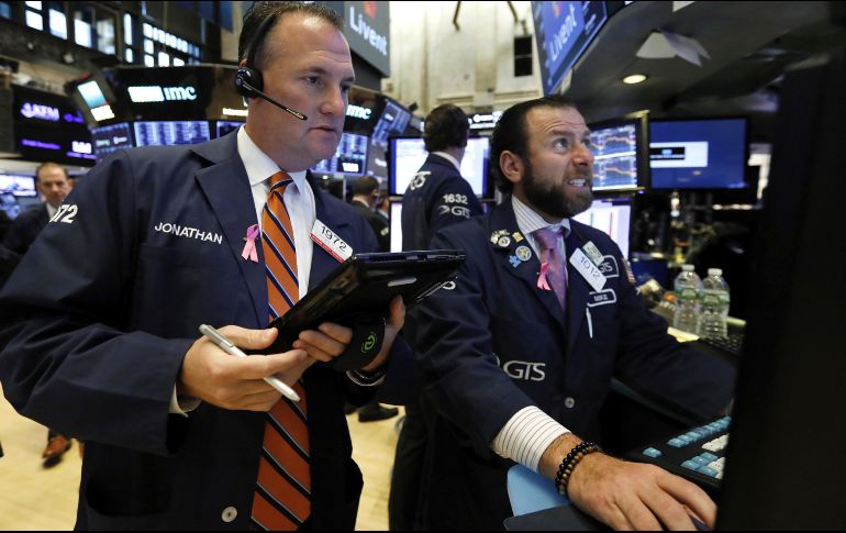 El promedio industrial Dow Jones ganó ocho unidades, menos del 0.1%, y se ubicó en 26 mil 727 puntos. AP/ARCHIVO