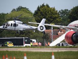 El aparato de Air India, un Boeing 777, fue escoltado hacia una zona aislada del aeropuerto. AFP/D. Leal-Olivas