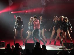 Temas como “Por perro”, “Suena el dembow”, “Cómo mirarte”, “Por fin te encontré” y “Alguien robó”, fueron las primeras sorpresas de la noche. EL INFORMADOR/E. Barrera