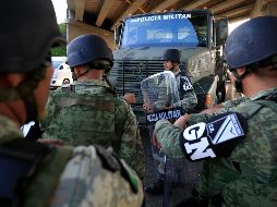 El representante de la Secretaría de Seguridad Ciudadana en Baja California, Isaías Bertín Sandoval, negó que la GN vaya a hacer tareas de migración. AP/R. Blackwell