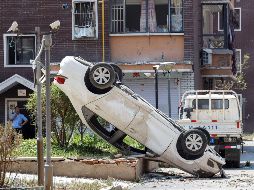 Daños por el paso del tornado en Kaiyuan. AFP