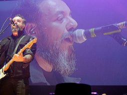 “¿Dónde jugarán lxs ninxs?”. La banda, durante la grabación de su concierto de aniversario en el Palacio de los Deportes. AFP