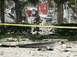 Bomberos encuentran tuberías de gas rotas en un local donde estaba una pizzería. AP