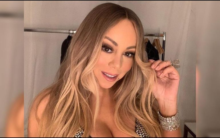 Mariah Carey sólo utiliza su voz en un grito para abrir la botella. INSTAGRAM / @mariahcarey