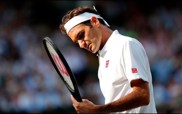 El suizo gana por por 4-6, 6-1, 6-4 y 6-4 en la pista central del All England Club londinense. AFP / A. Dennis