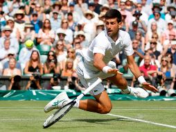 Con esta victoria, ''Nole'' logra su semifinal 25 de un Grand Slam, y el triunfo 71 en el torneo londinense. AFP / C. Recine